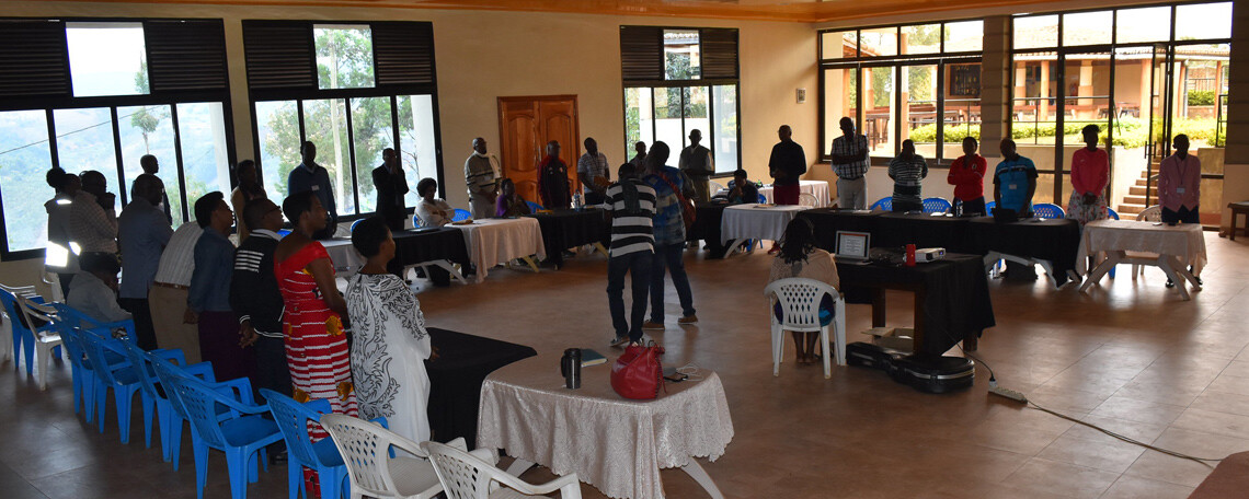 a prayer meeting with people sat around tables