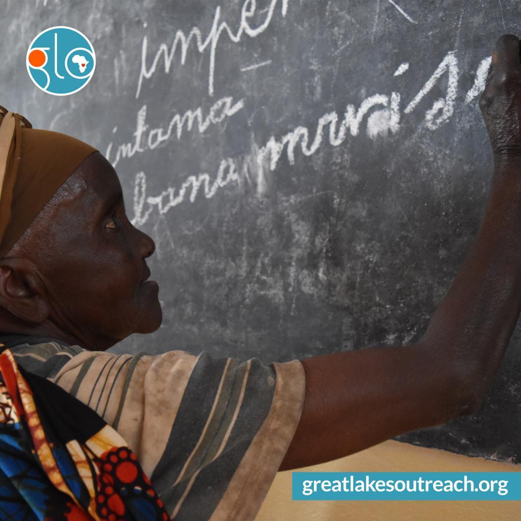 glo literacy lessons woman write on blackboard