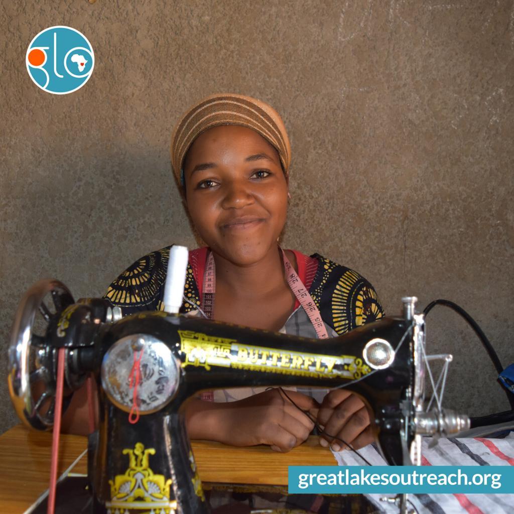 GLO sewing projects smiling woman sewing machine